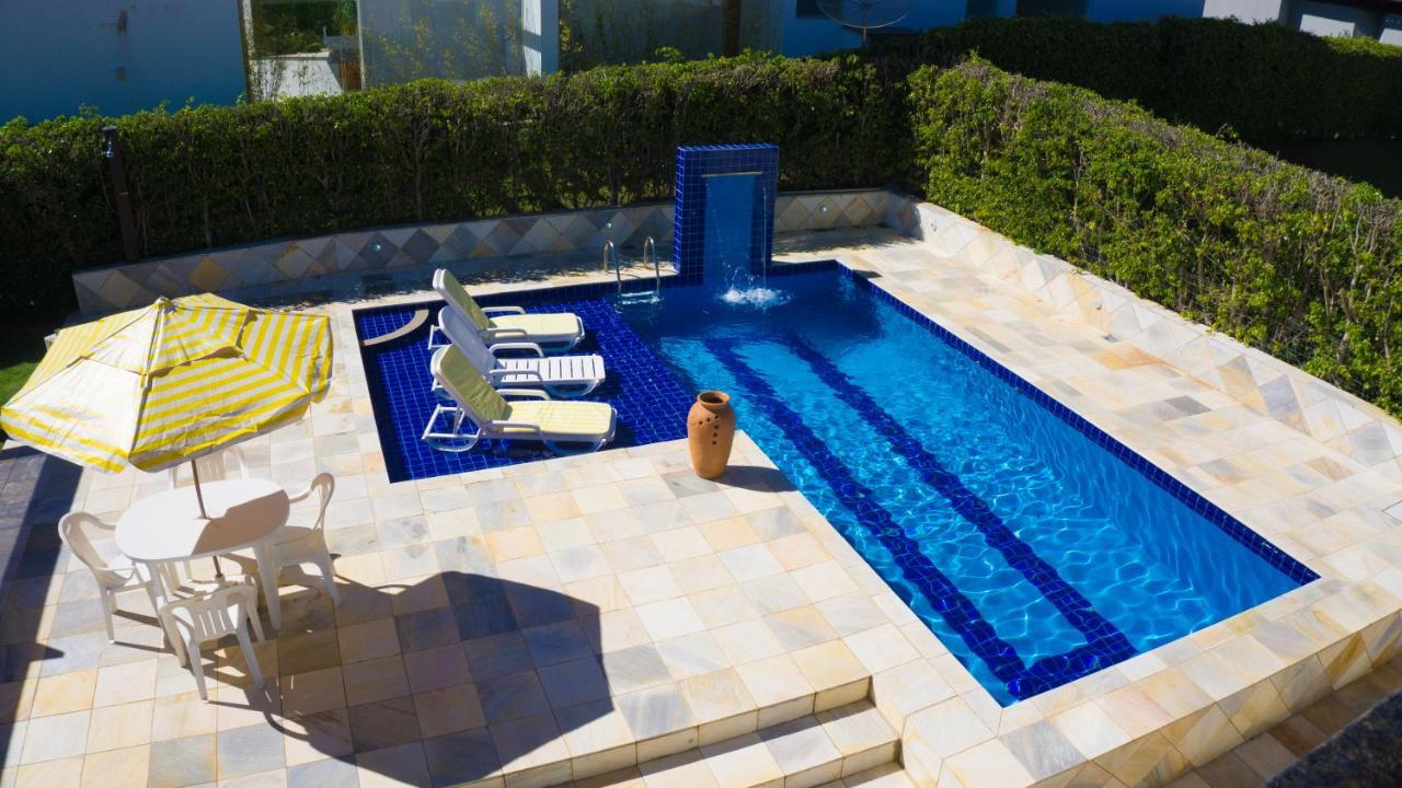 Suites Jardim Dos Lagos กาปีตอลิโอ ภายนอก รูปภาพ